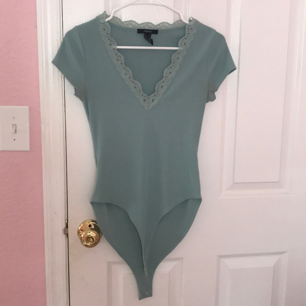 Forever 21 Teal bodysuit with lace v-cut.